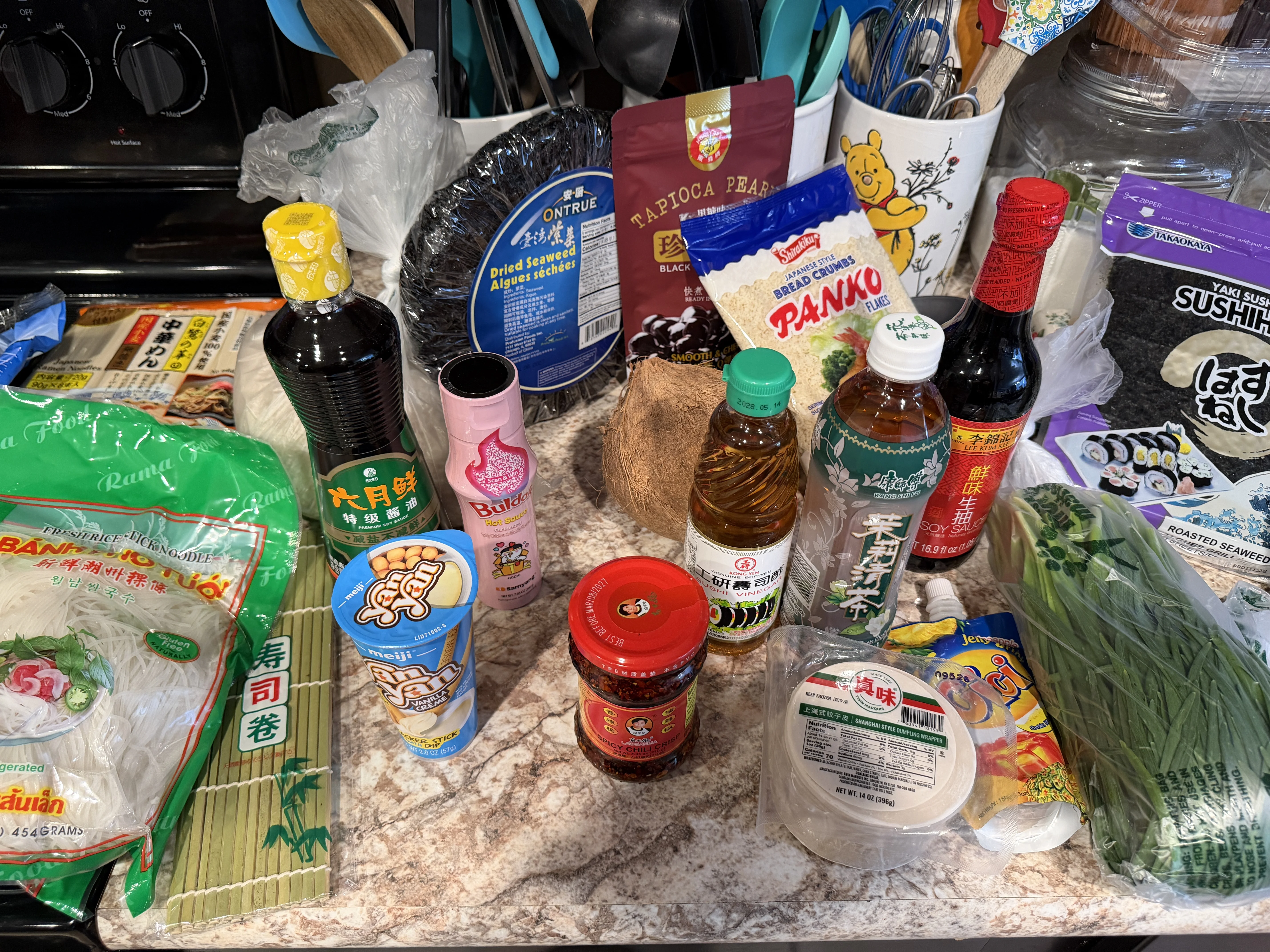 Hong Kong Market haul - panko, sushi mat, chili oil, sesame oil, and spices