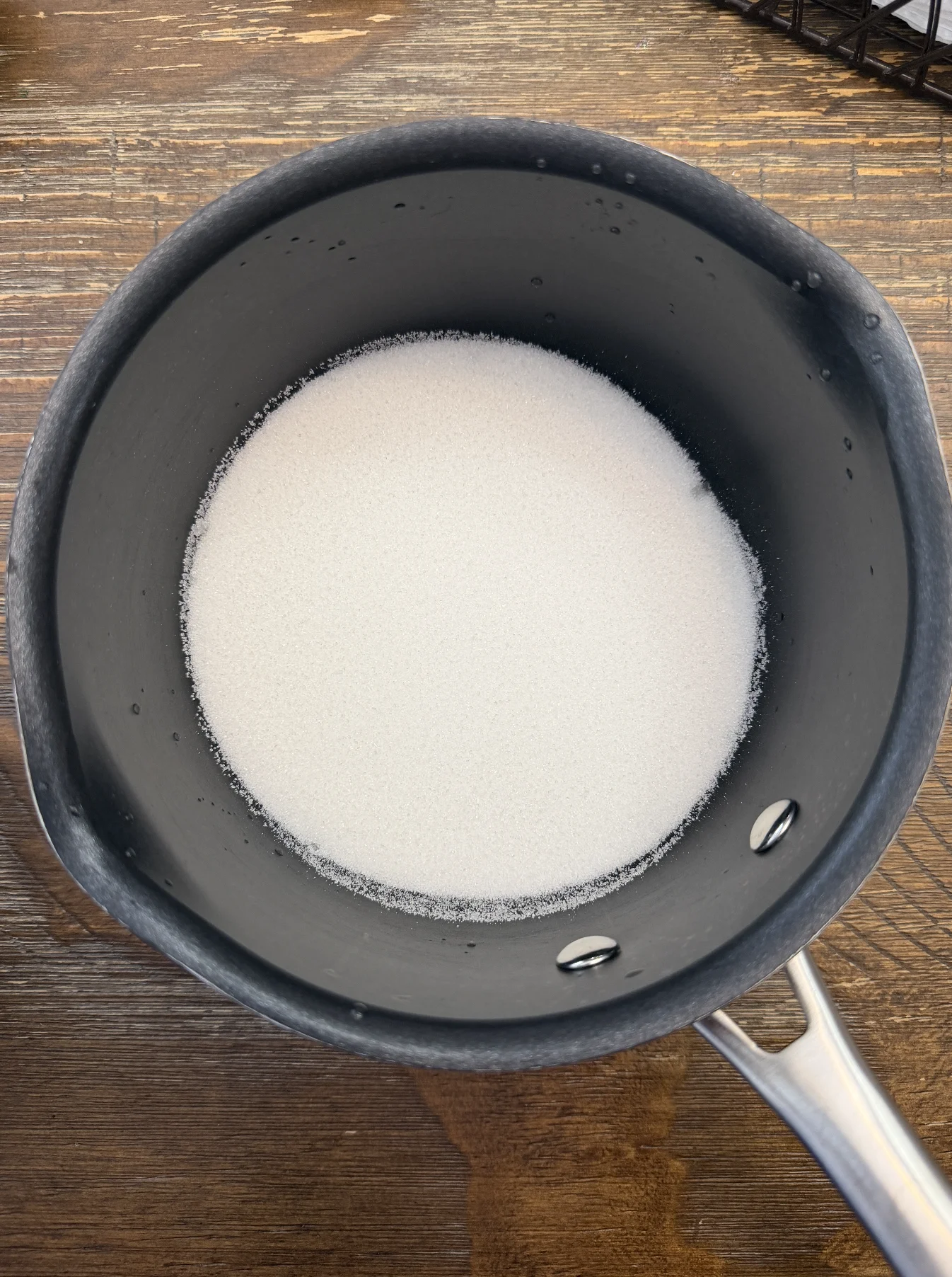 Pot of sugar on the stove for simple syrup