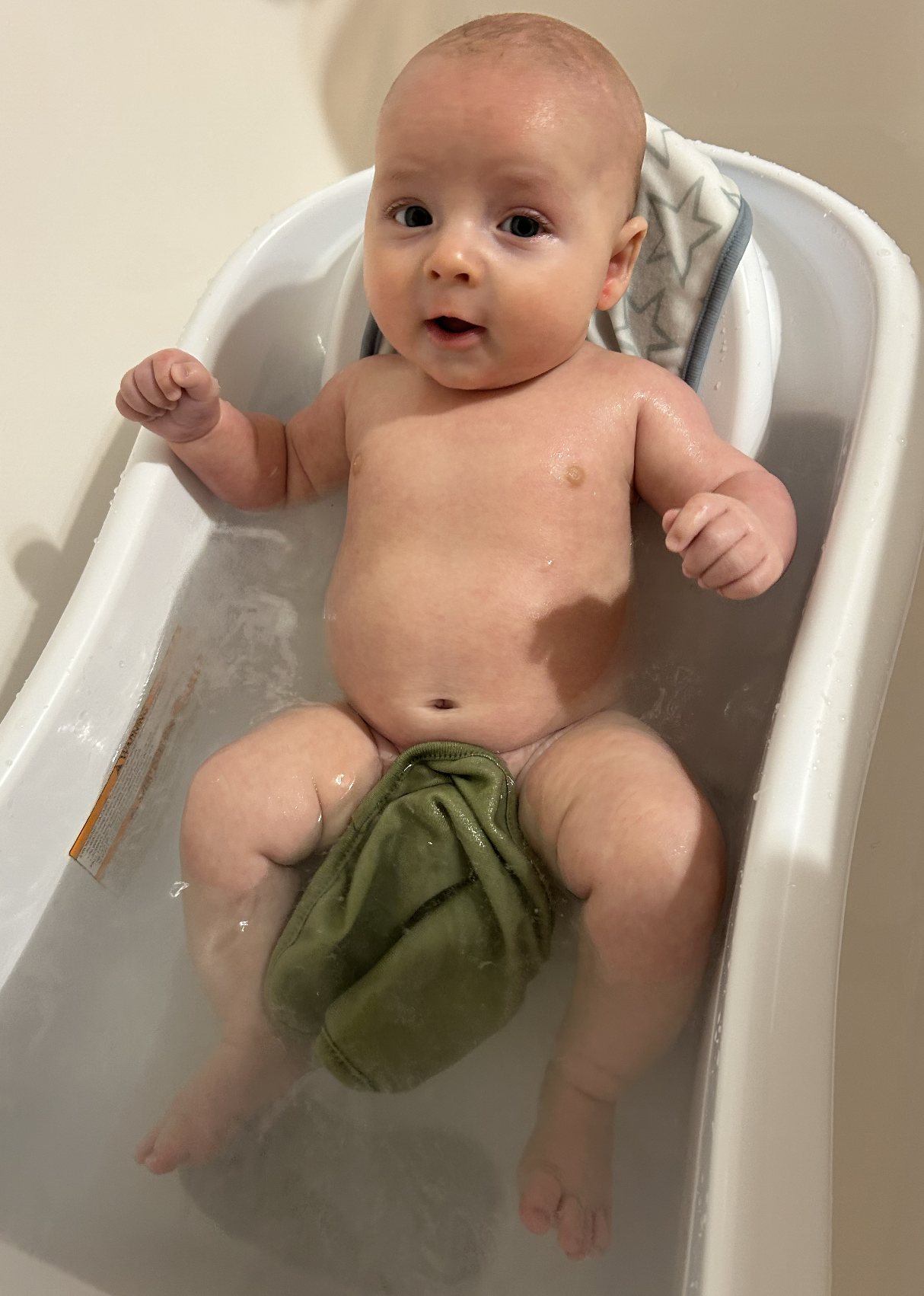 Raphael Corwyn McGennis enjoying bath time