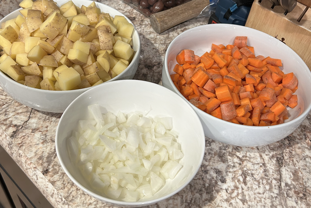 Chopped vegetables - potatoes, carrots, onions